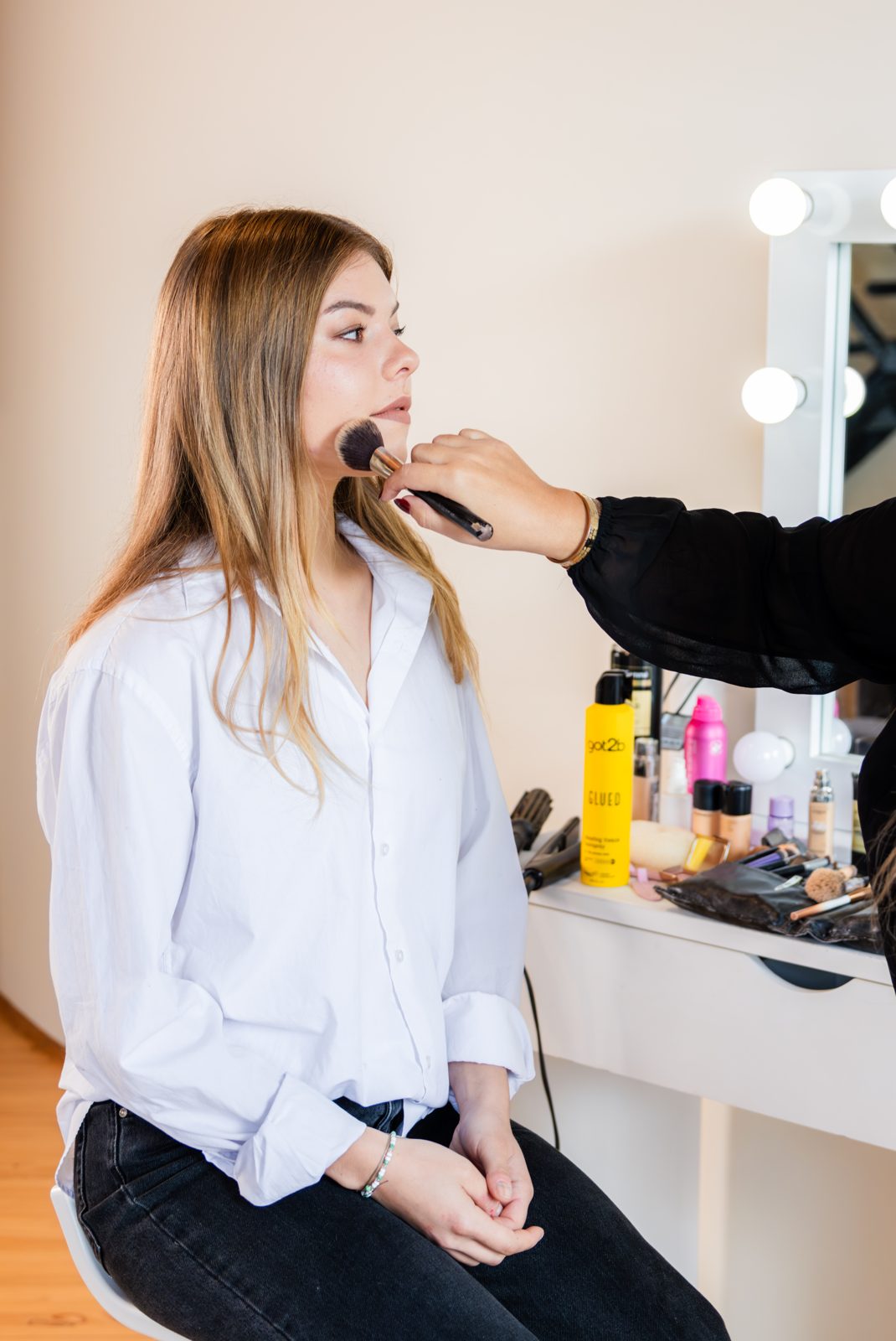 At the vanity, getting ready for a bridal stay